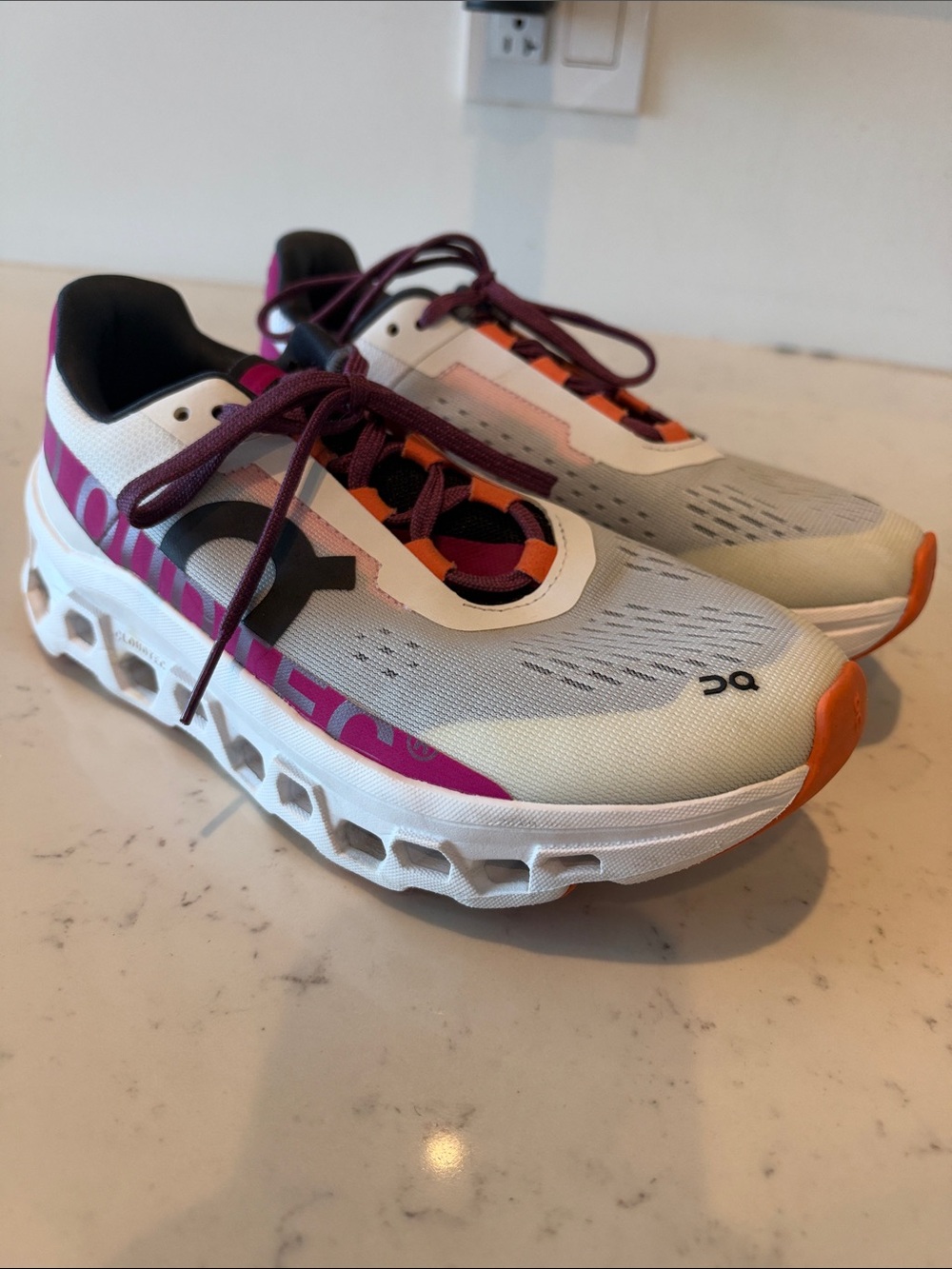 On Running Women Cloudmonster Sneakers in White with Pink & Orange Accents